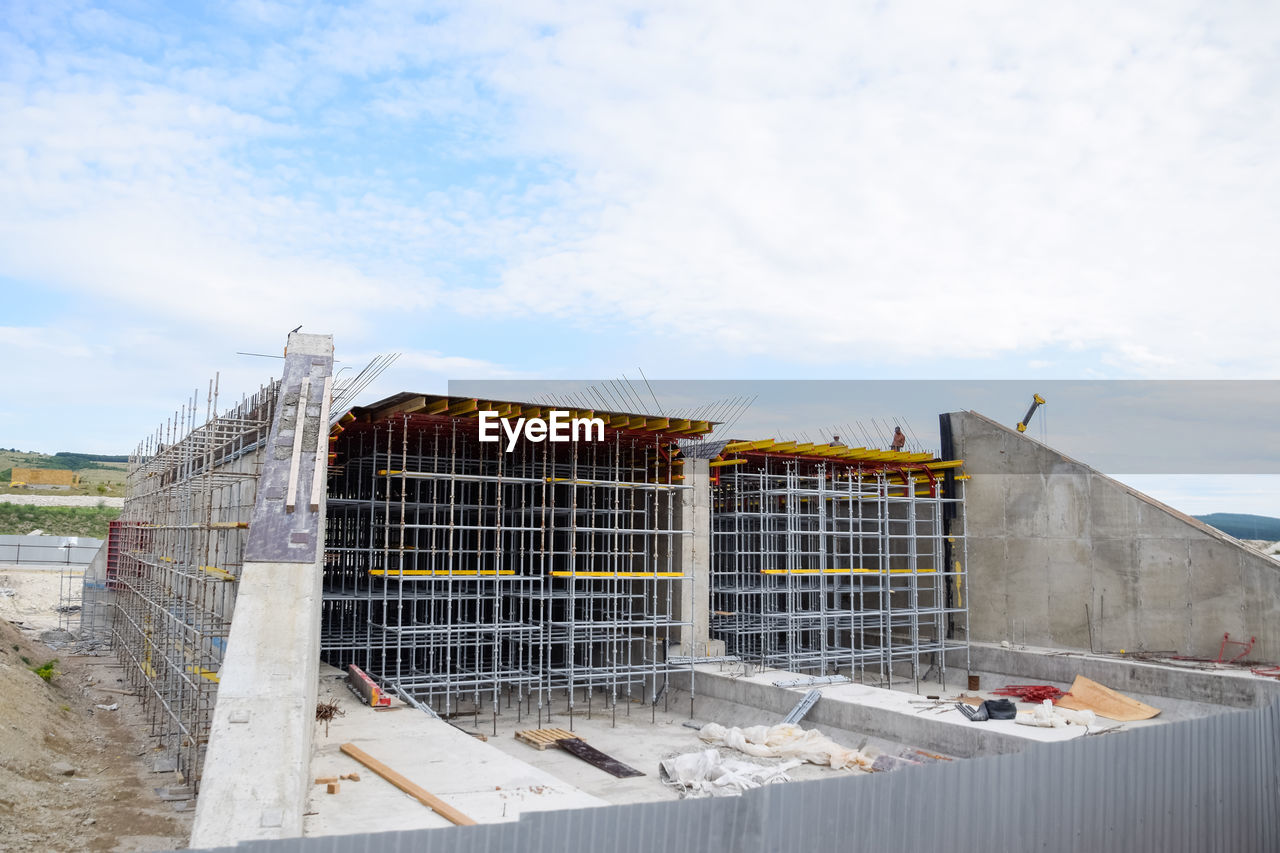 LOW ANGLE VIEW OF CONSTRUCTION SITE