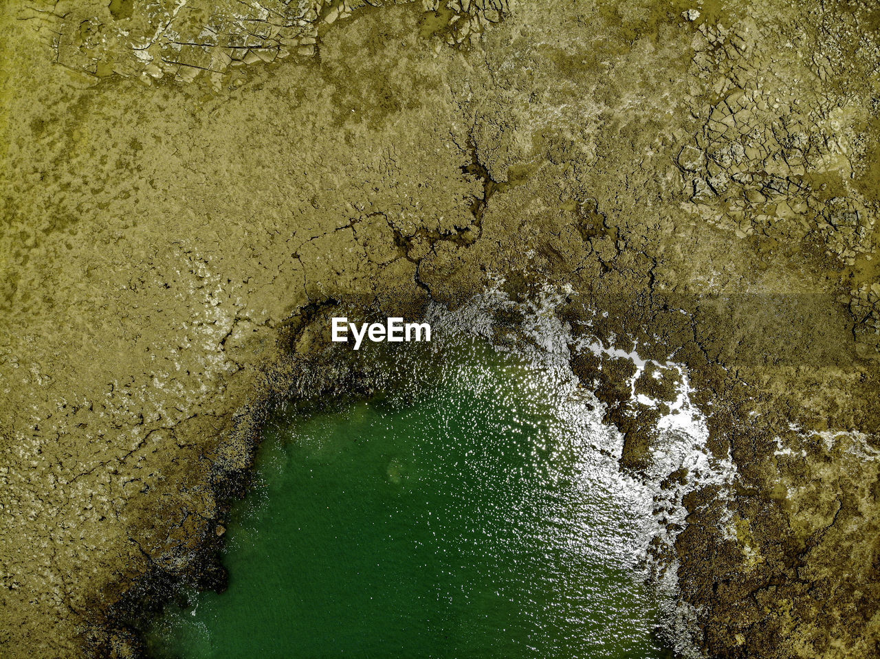 water, nature, reflection, no people, high angle view, day, outdoors, green, land, beauty in nature, sea, wet, sunlight, beach, textured