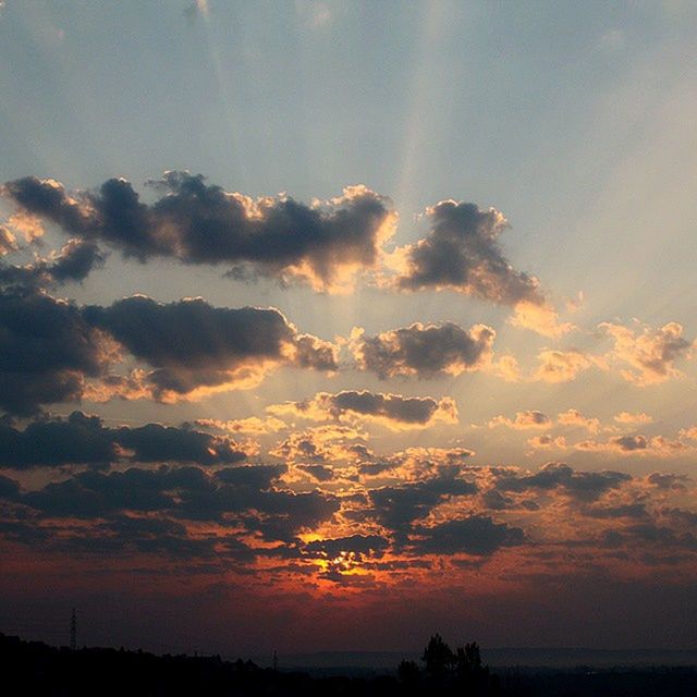 SUNSET OVER LANDSCAPE