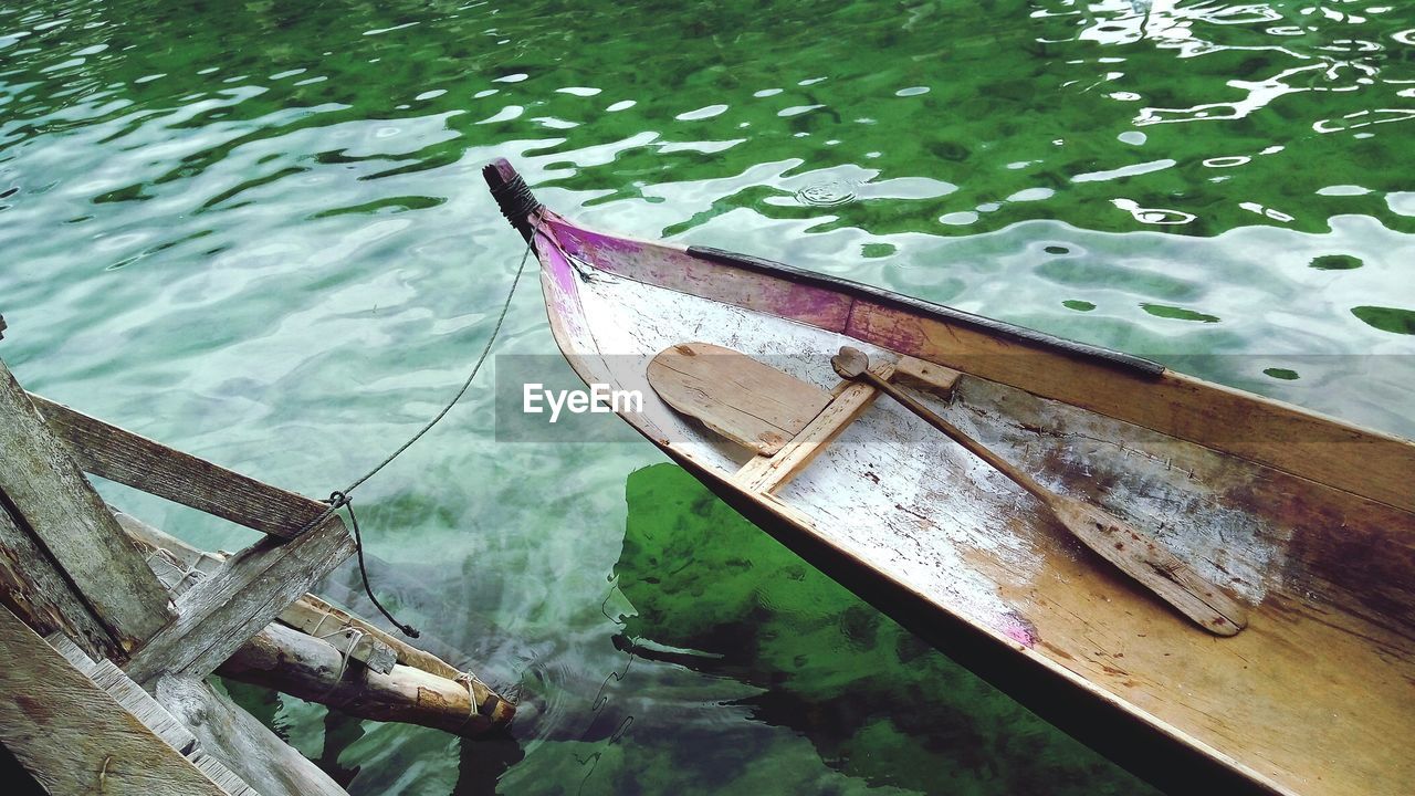 High angle view of boat moored in lake