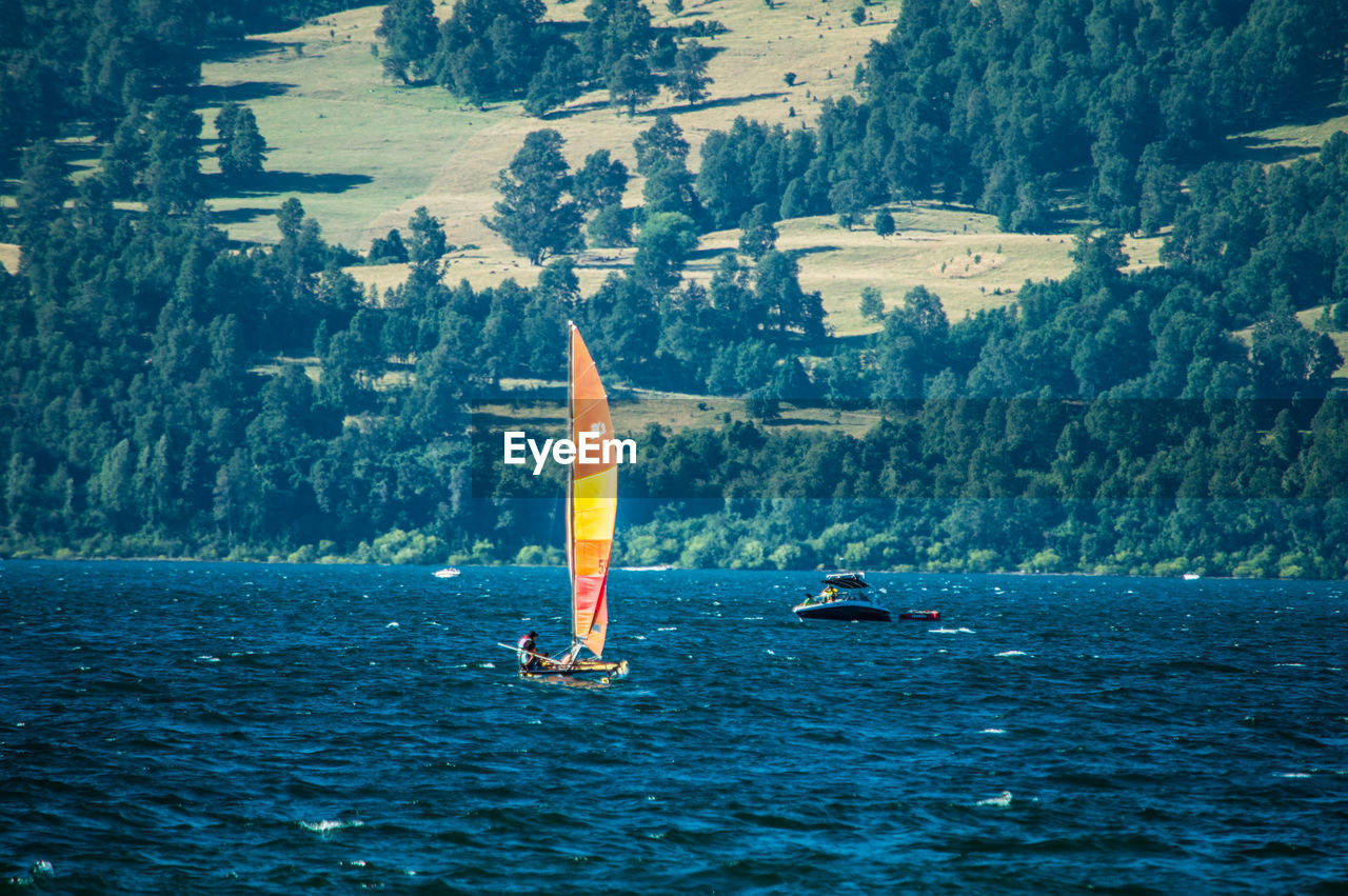 Boat sailing on river