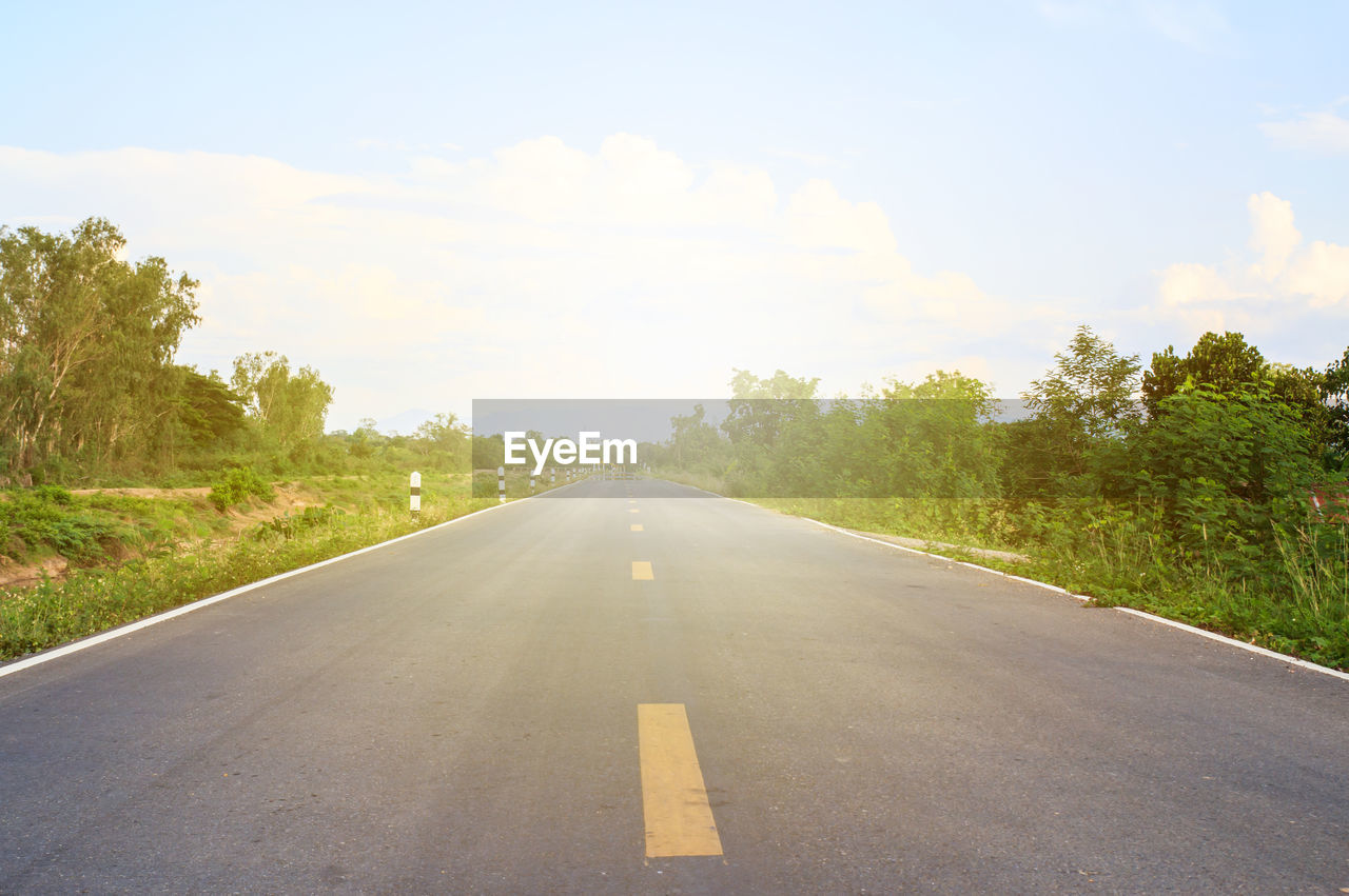 Surface level of empty road against sky