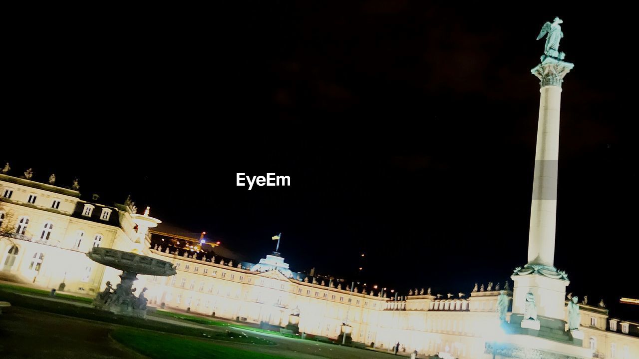 VIEW OF ILLUMINATED BUILDING AT NIGHT