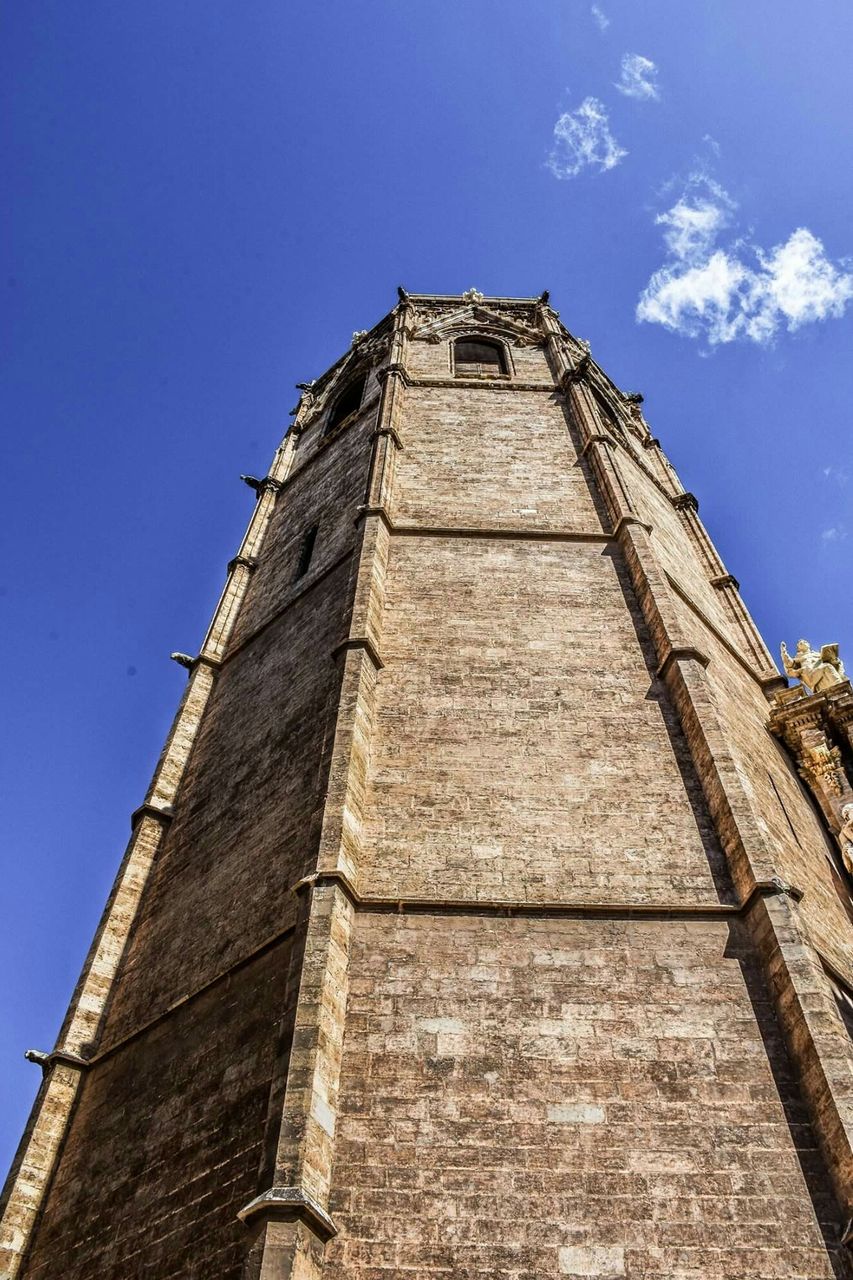 Low angle view of building against blue sky