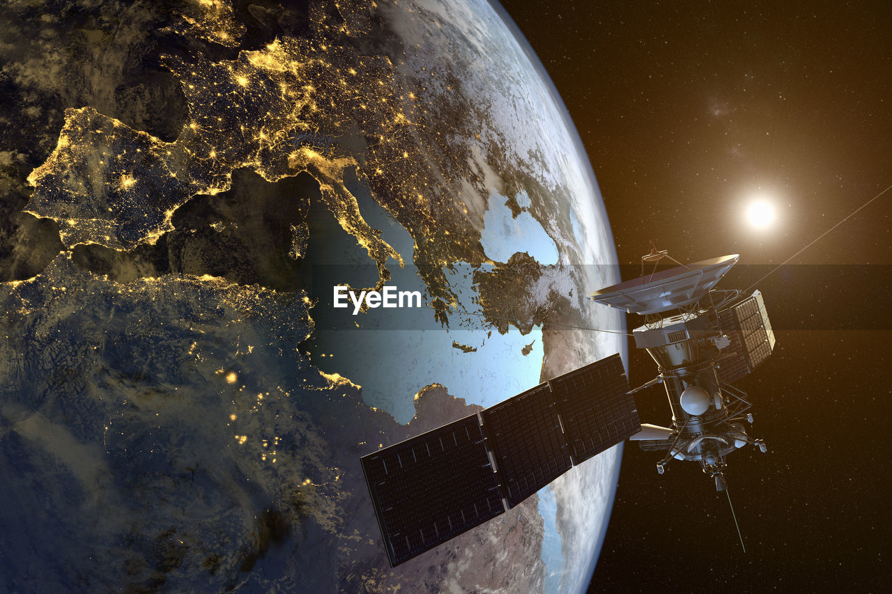 Satellite against earth