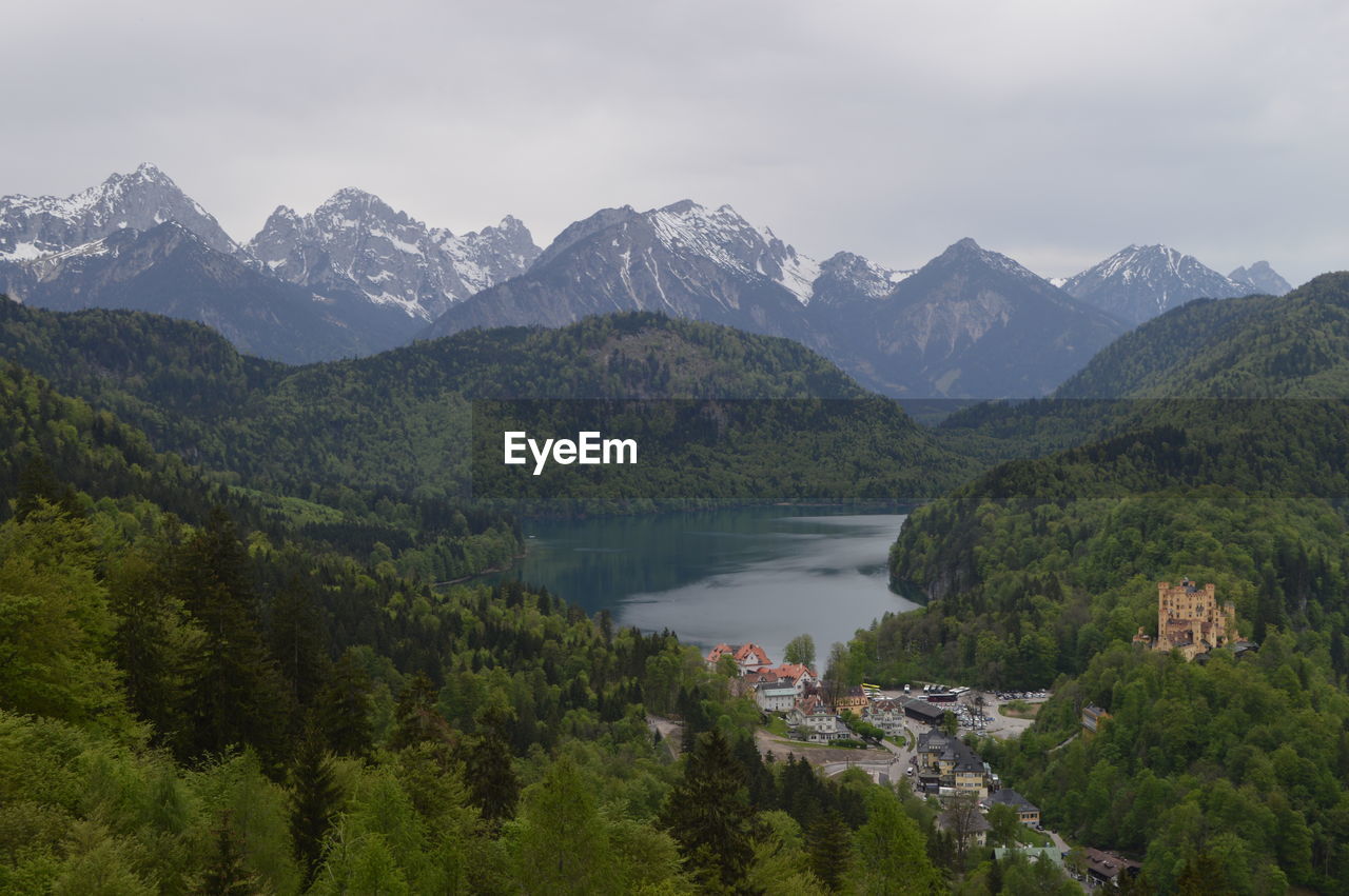 Scenic view of mountains and lake against sky