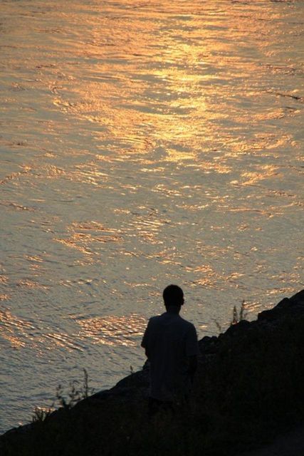 SILHOUETTE OF WOMAN IN SKY