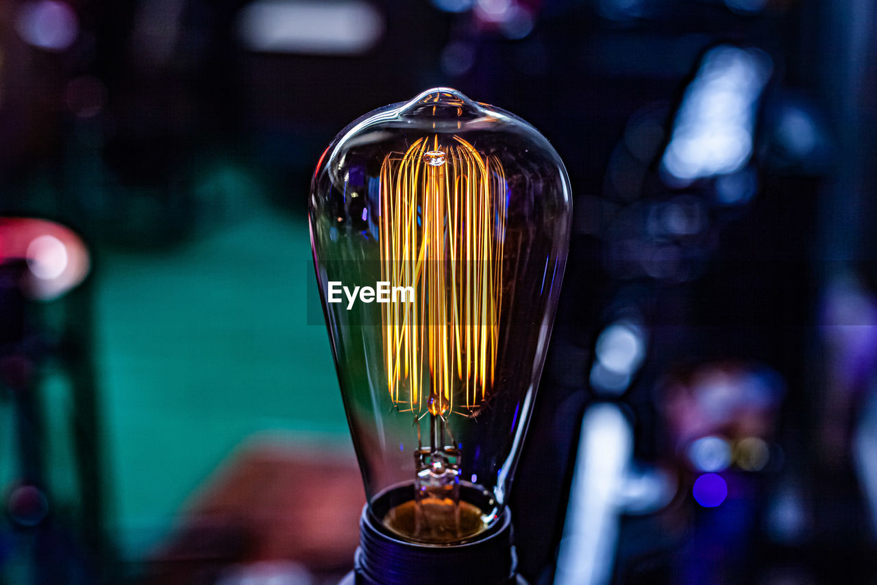 Close-up of illuminated light bulb