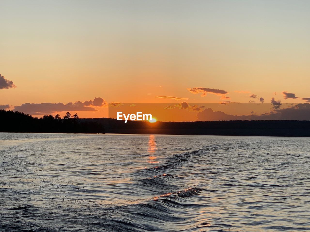 SCENIC VIEW OF SEA DURING SUNSET