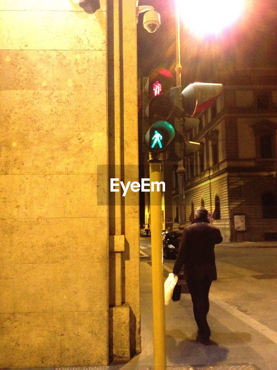 WOMAN STANDING ON RAILING