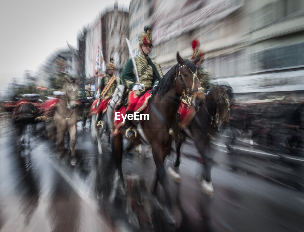 BLURRED MOTION OF PEOPLE ON BUS