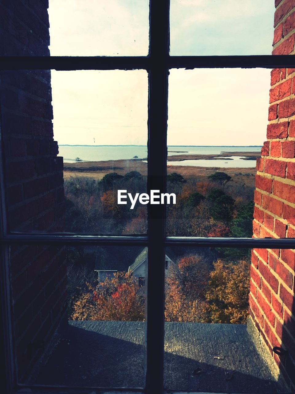 Brick wall and landscape view from window