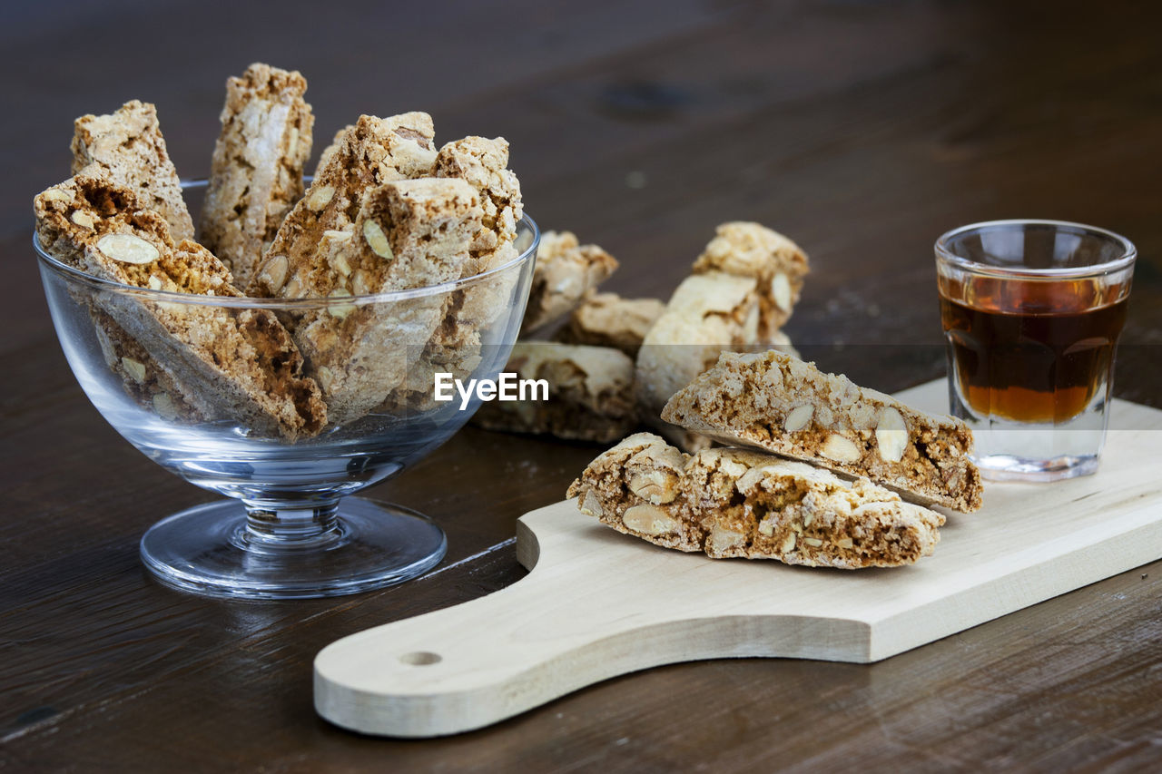 Close-up of biscotti served on wooden table