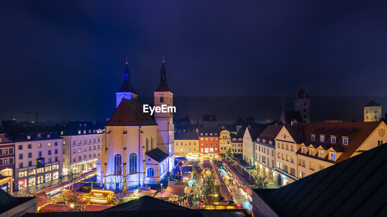 ILLUMINATED BUILDINGS AT NIGHT