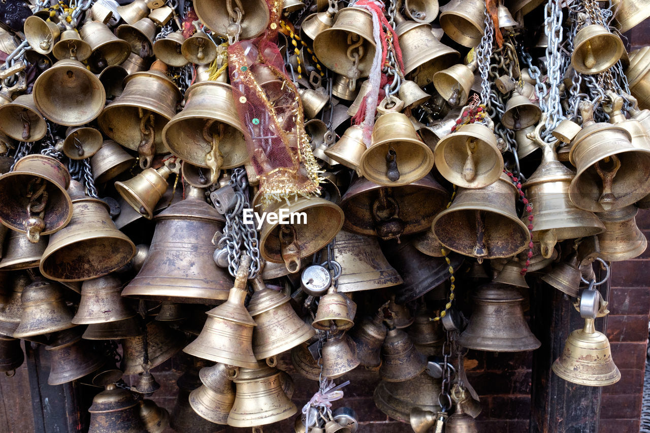 Full frame shot of bells for sale at market