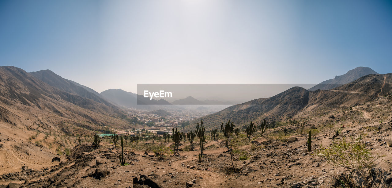 Scenic view of mountains against clear sky