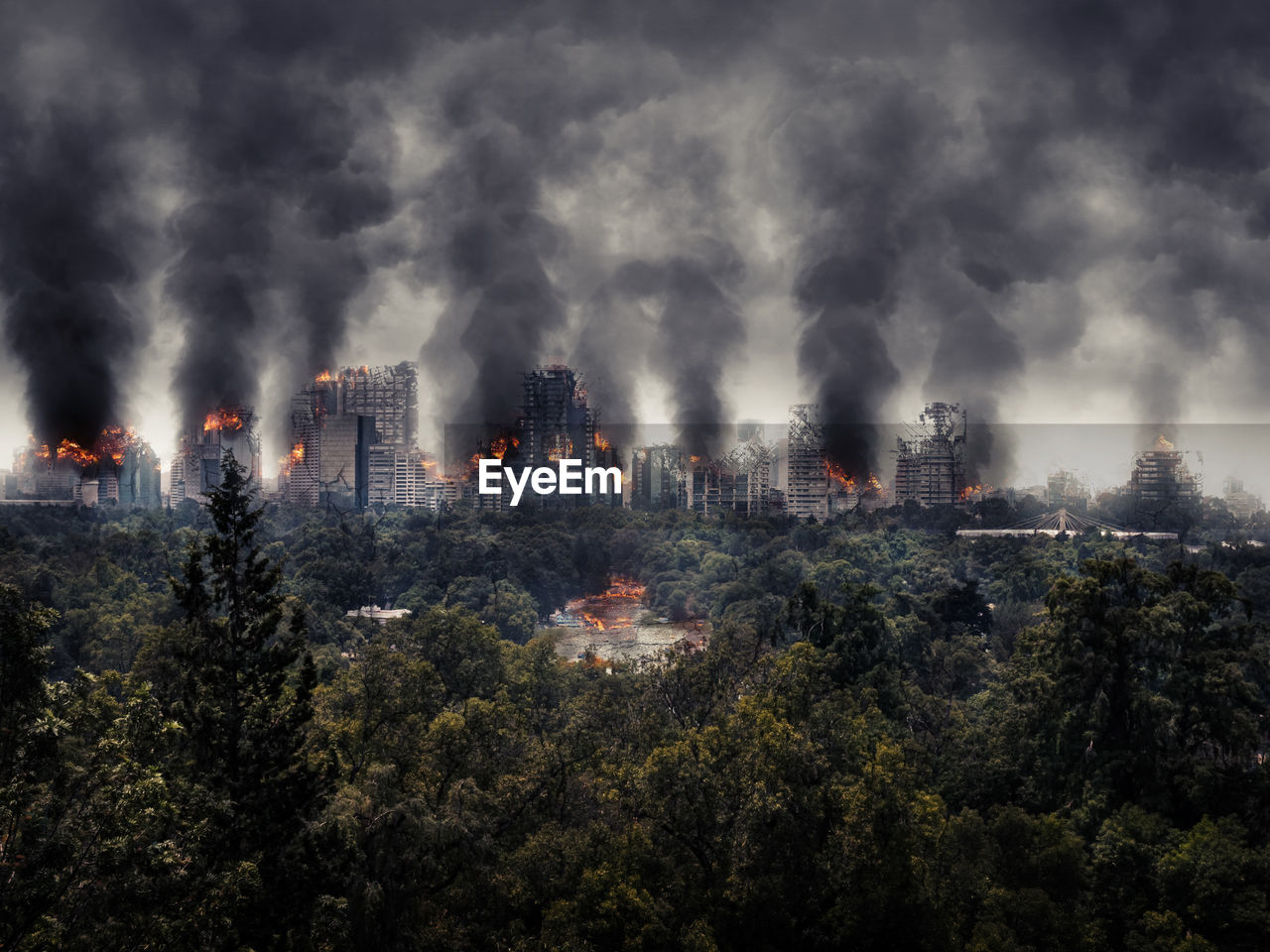 PANORAMIC VIEW OF BUILDINGS AGAINST CLOUDY SKY