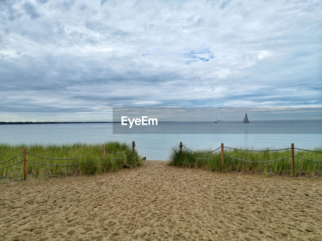 Scenic view of beach against sky