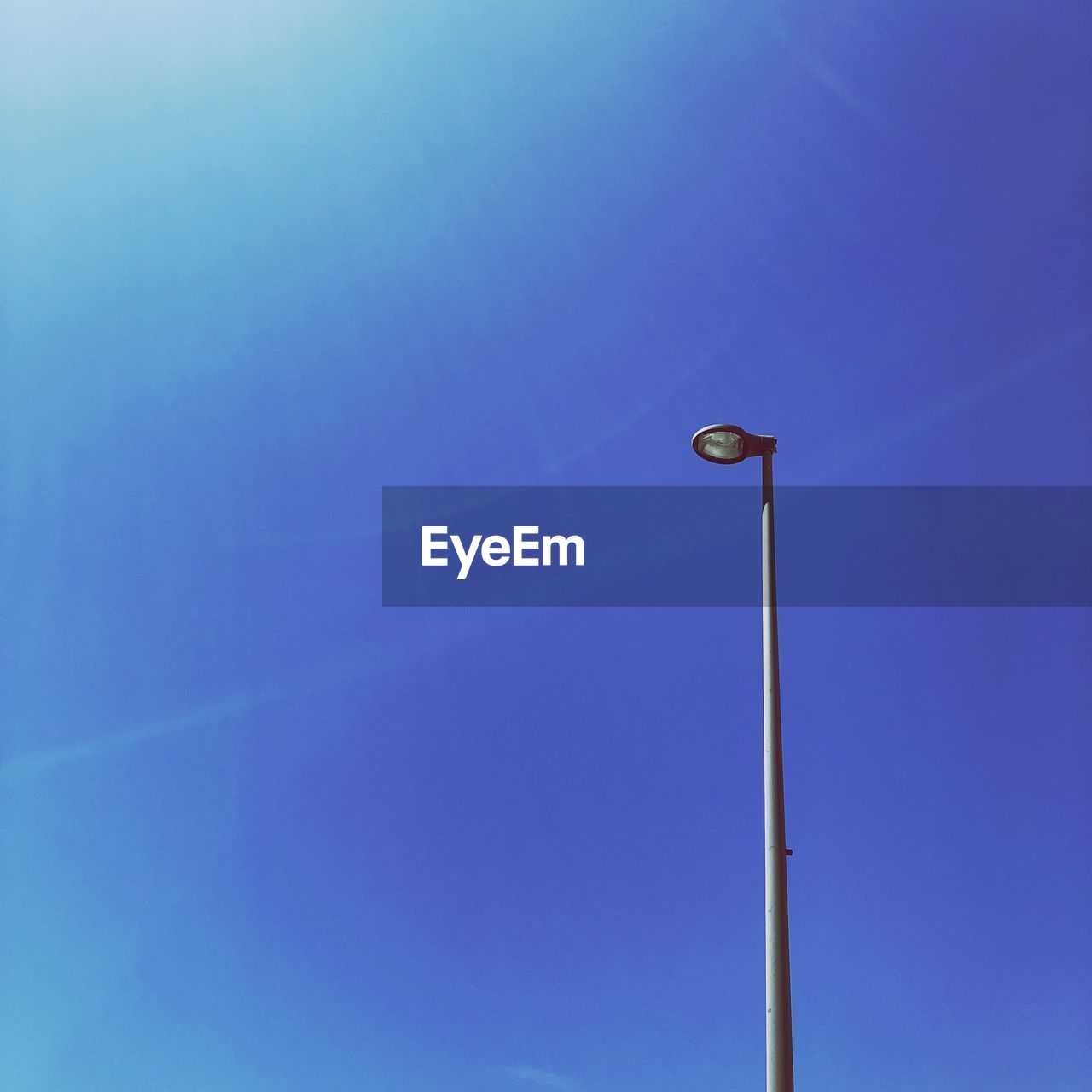 LOW ANGLE VIEW OF STREET LIGHT AGAINST SKY