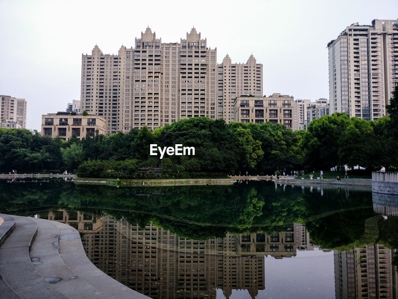 Reflection of buildings in calm water