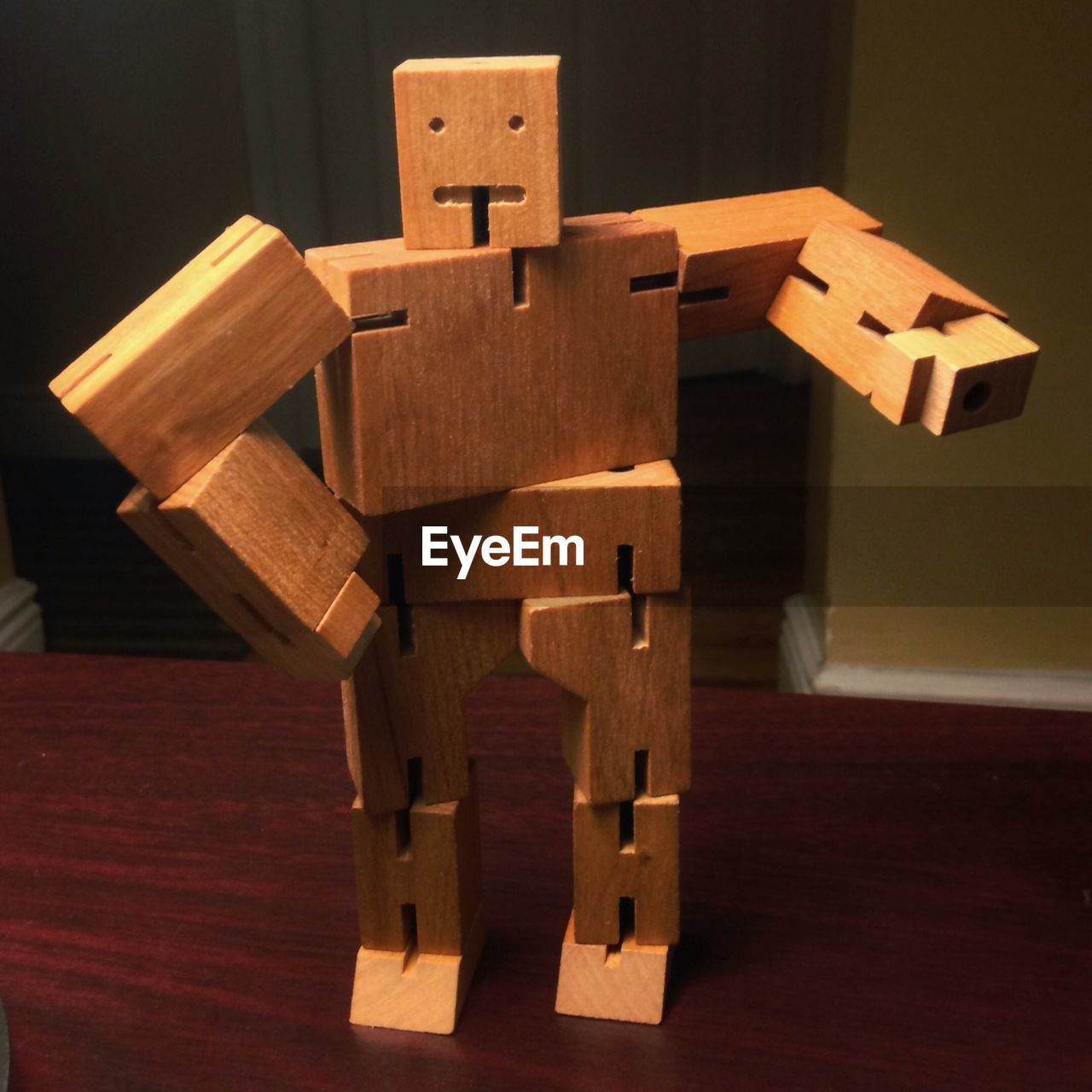 CLOSE-UP OF WOODEN TOY ON TABLE