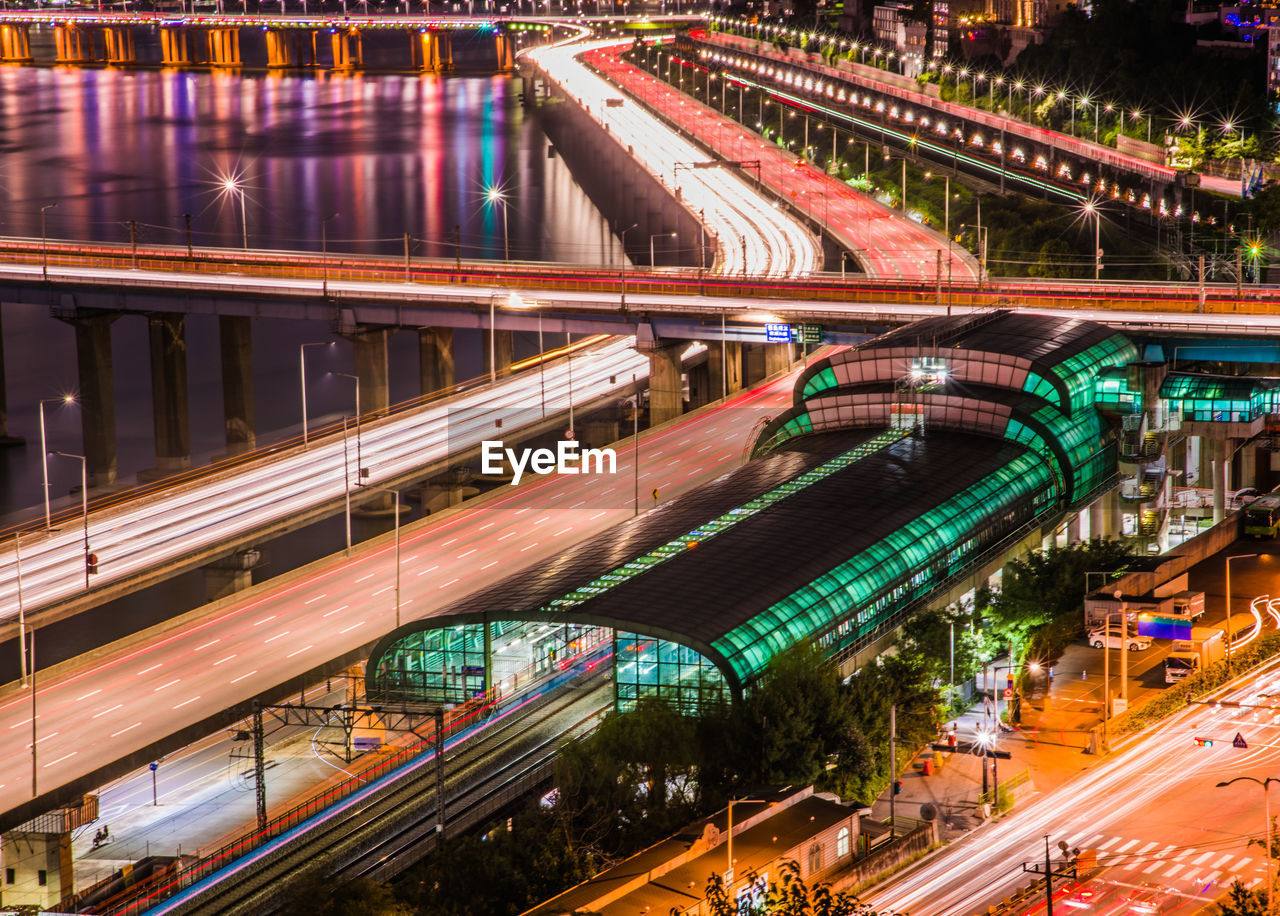 High angle view of light trails on road at night