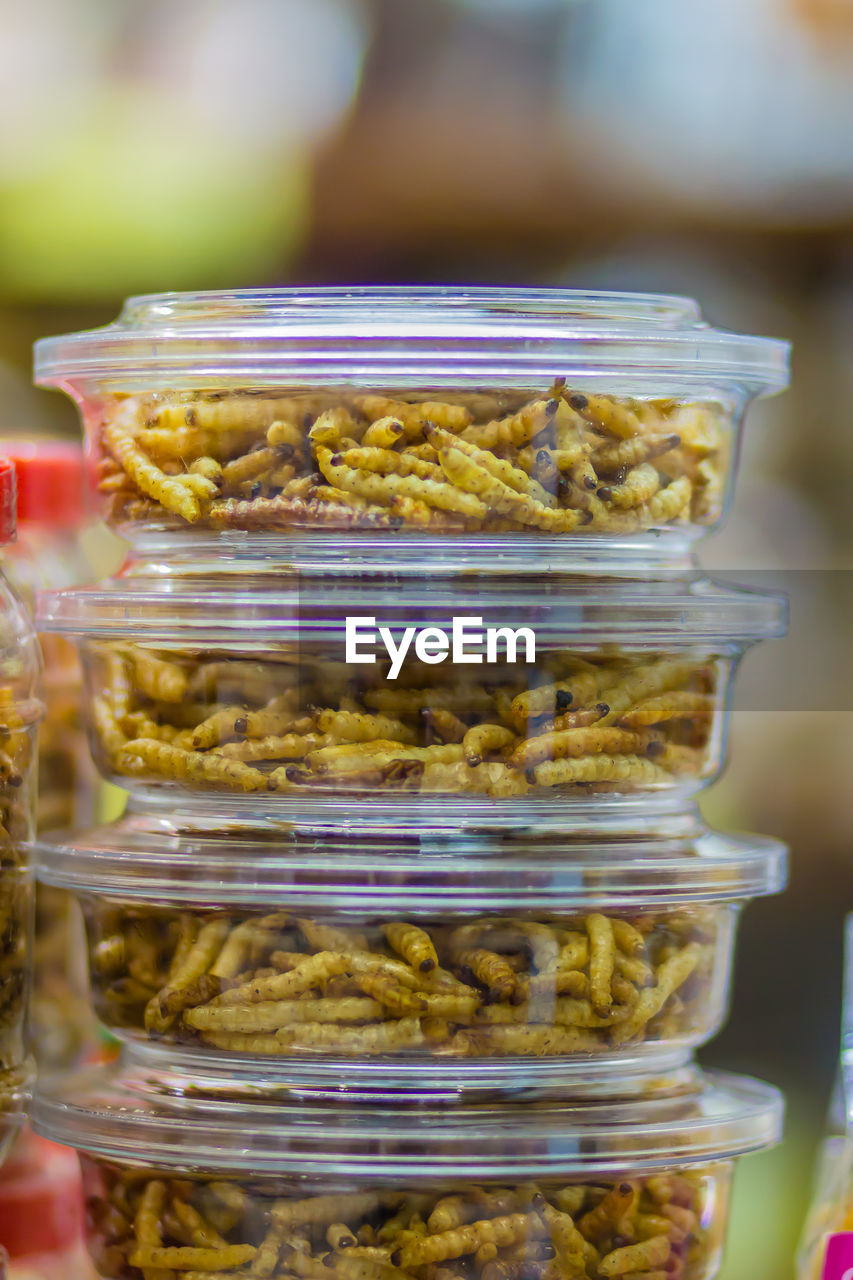 CLOSE-UP OF FOOD ON GLASS