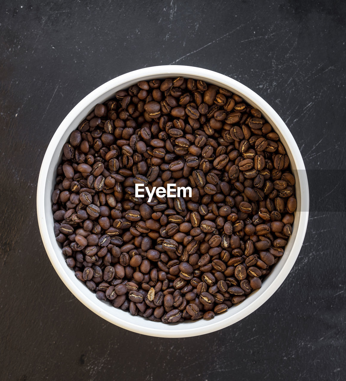 HIGH ANGLE VIEW OF COFFEE BEANS IN CONTAINER