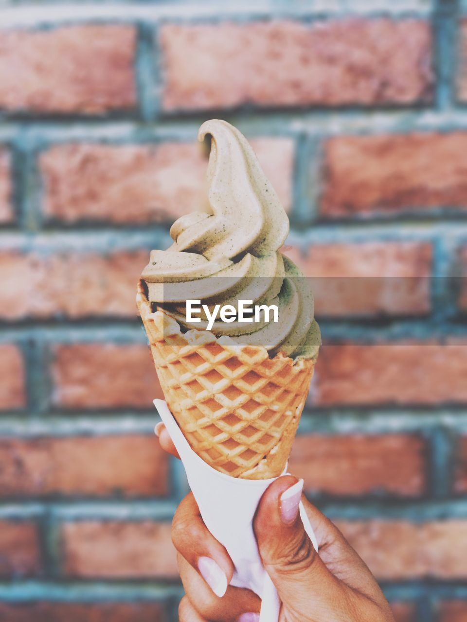 Close-up of ice cream in hand