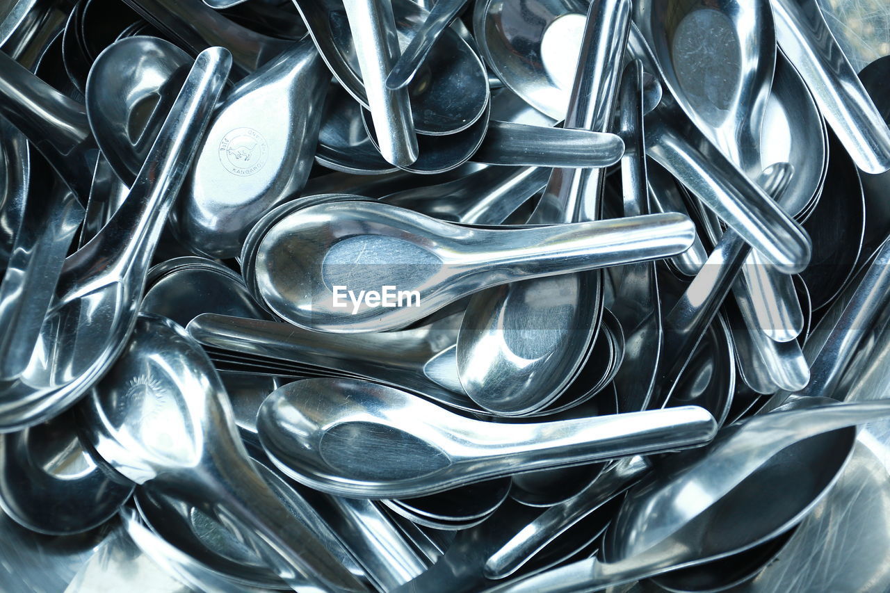 Close-up of metallic spoons