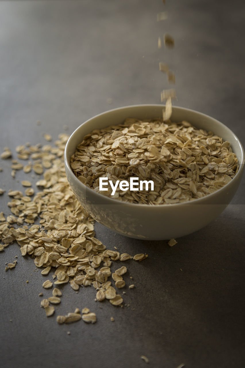 Close-up of oats in bowl on table