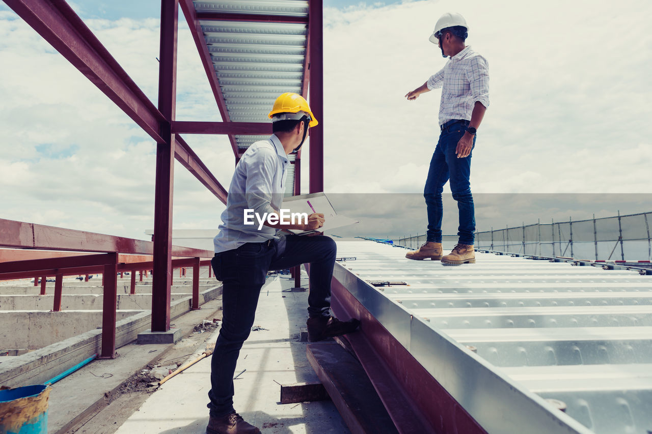 Project engineer, engineer and technician working on construction site