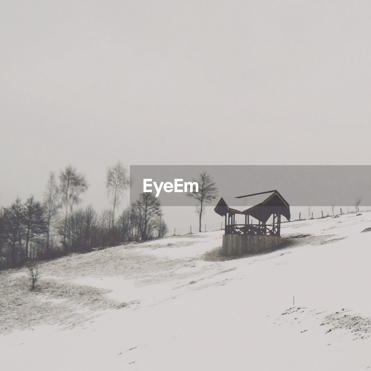 VIEW OF SNOW COVERED LANDSCAPE