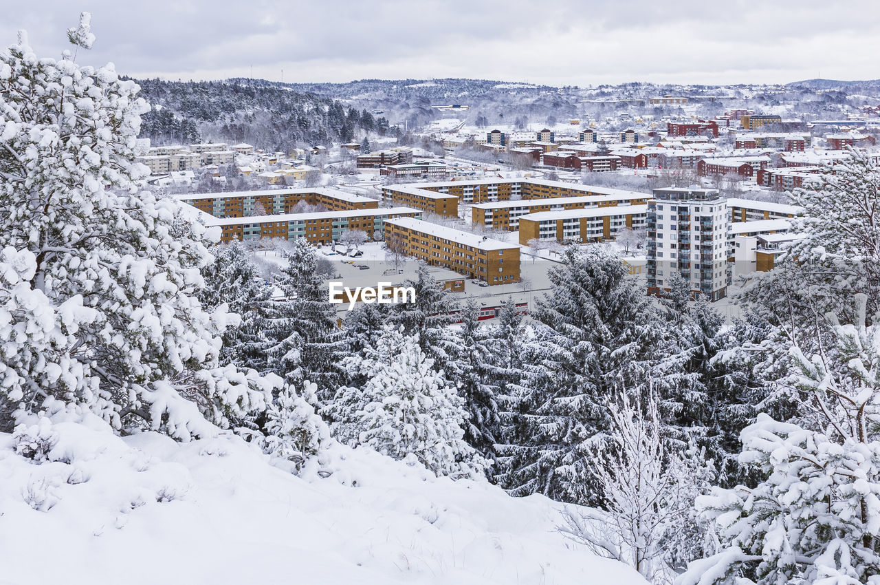 High angle view of townscape against sky in winter