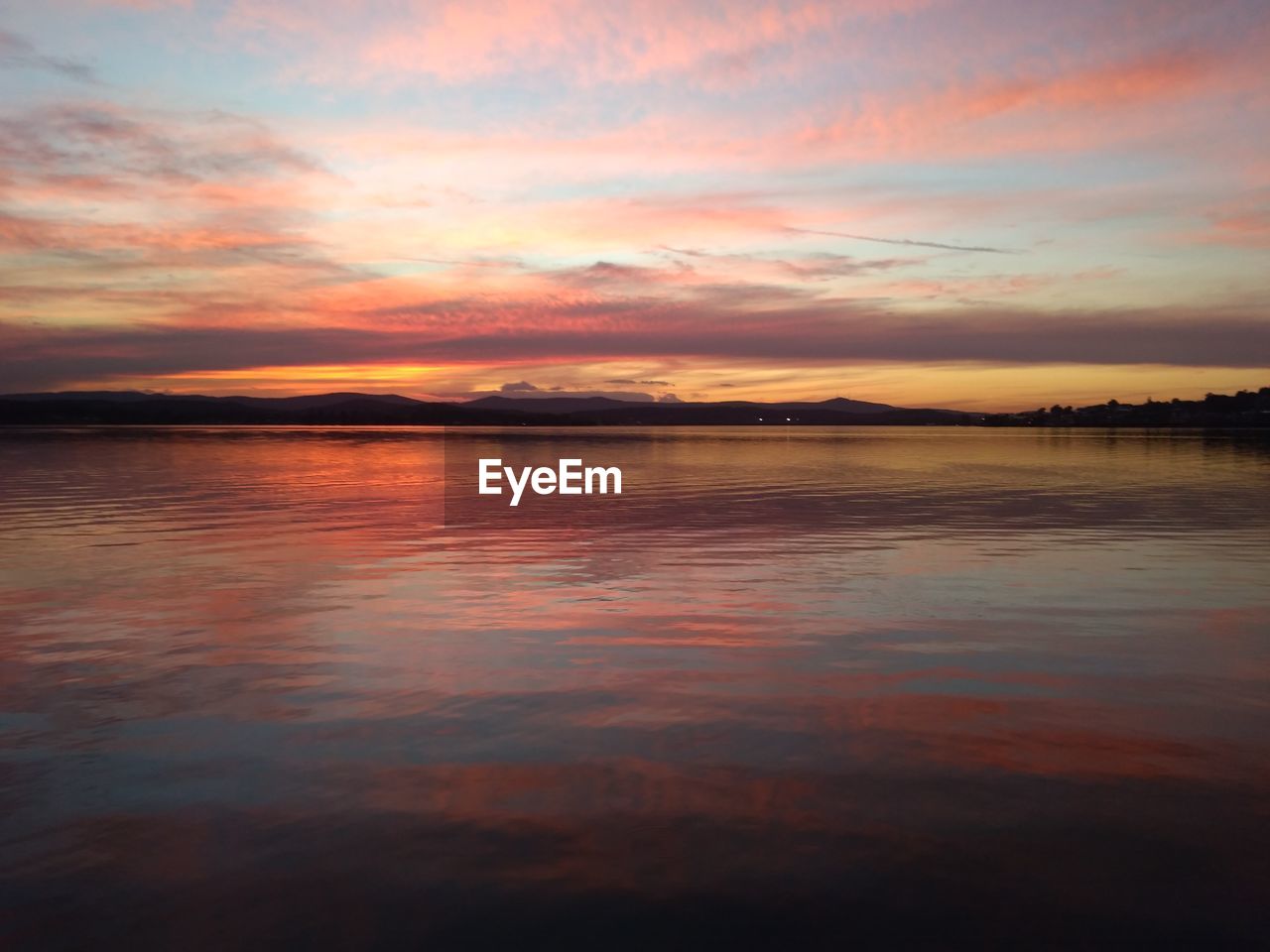 SCENIC VIEW OF SEA AGAINST ROMANTIC SKY