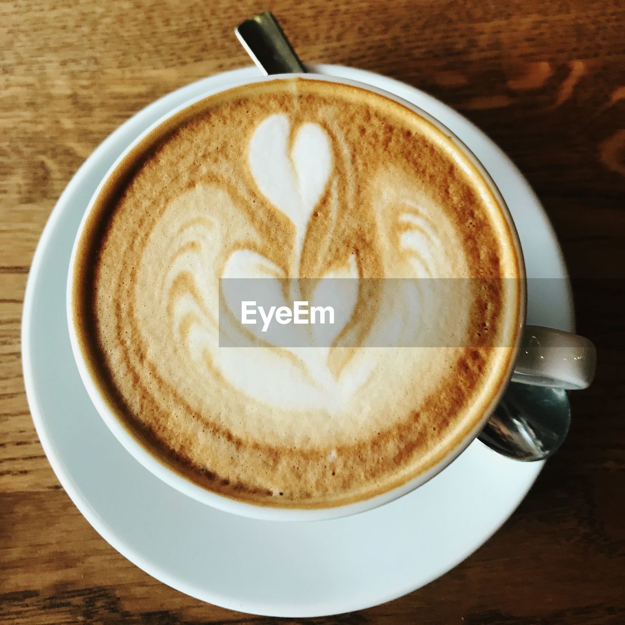 Close-up of cappuccino on table