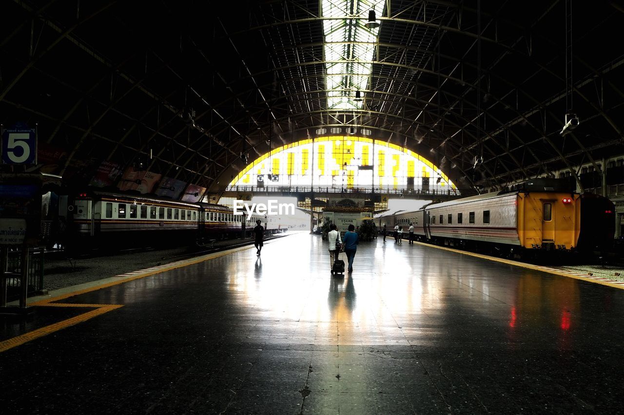 TRAIN IN RAILROAD STATION