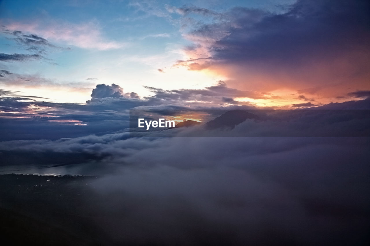 SCENIC VIEW OF CLOUDSCAPE DURING SUNSET