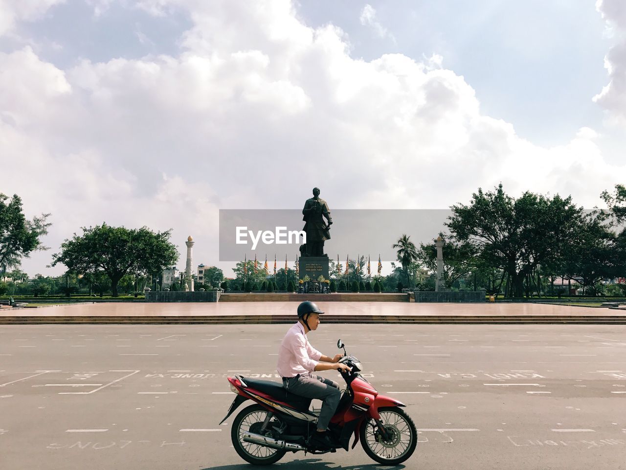 MAN RIDING BICYCLE