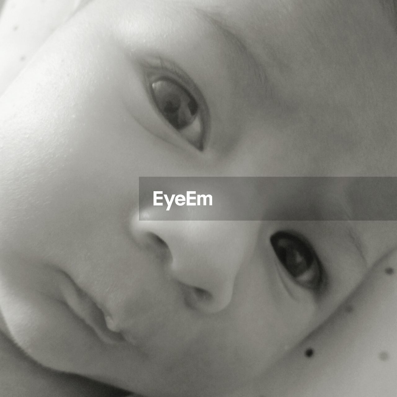 CLOSE-UP PORTRAIT OF CUTE BOY WITH BABY