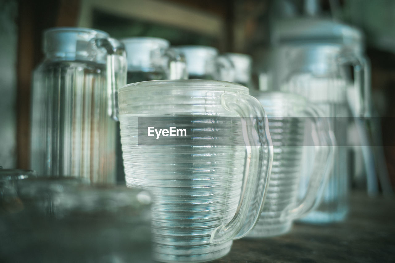 Close-up of glass jar on table