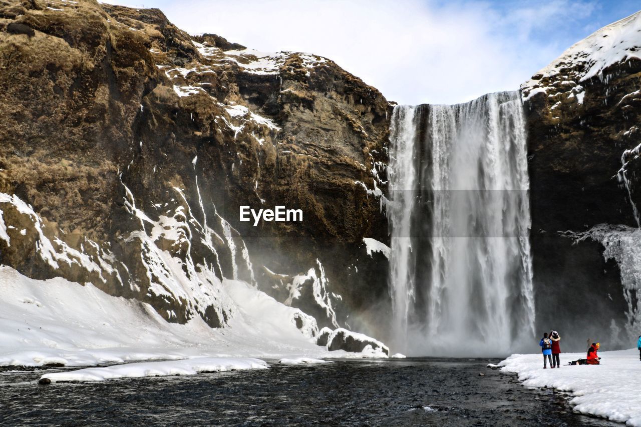 SCENIC VIEW OF WATERFALL