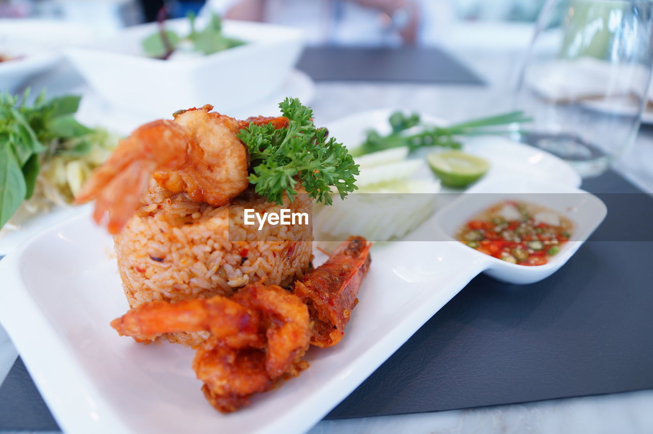 CLOSE-UP OF MEAL SERVED ON TABLE