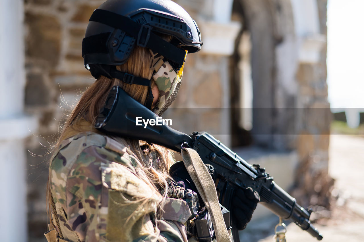 side view of army soldier wearing hat