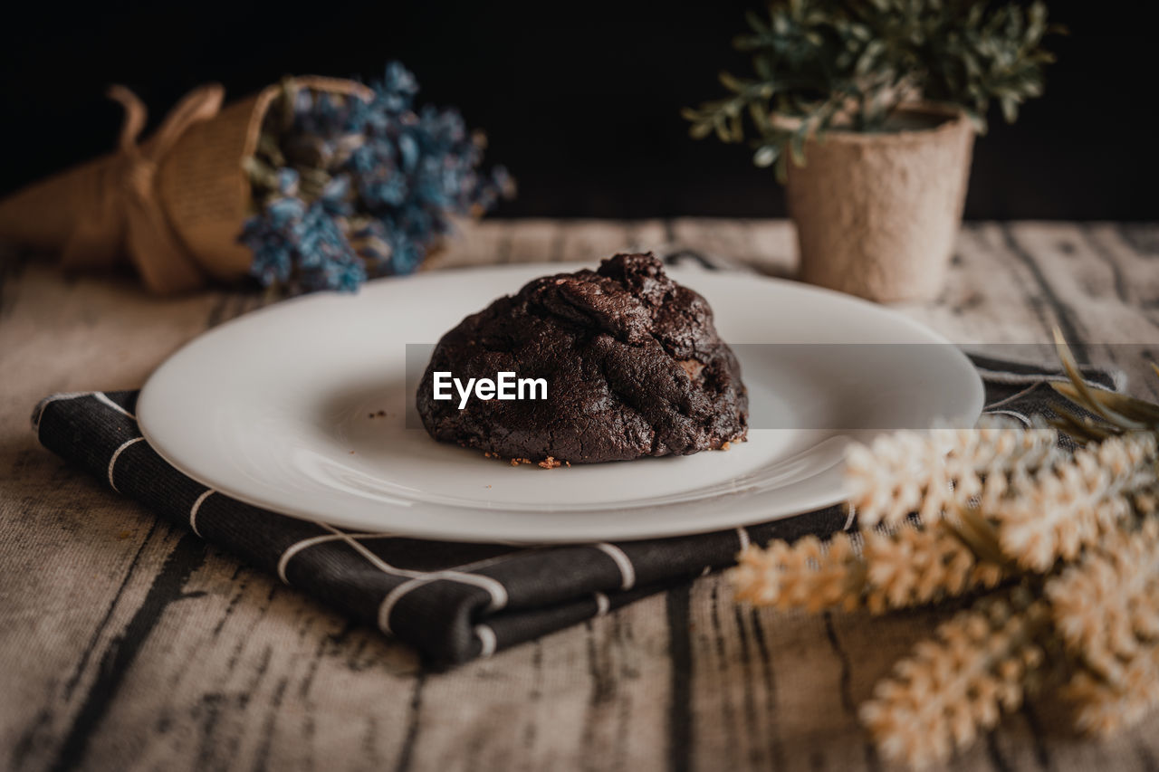 Close-up of double chocolate chip cookie dessert on table