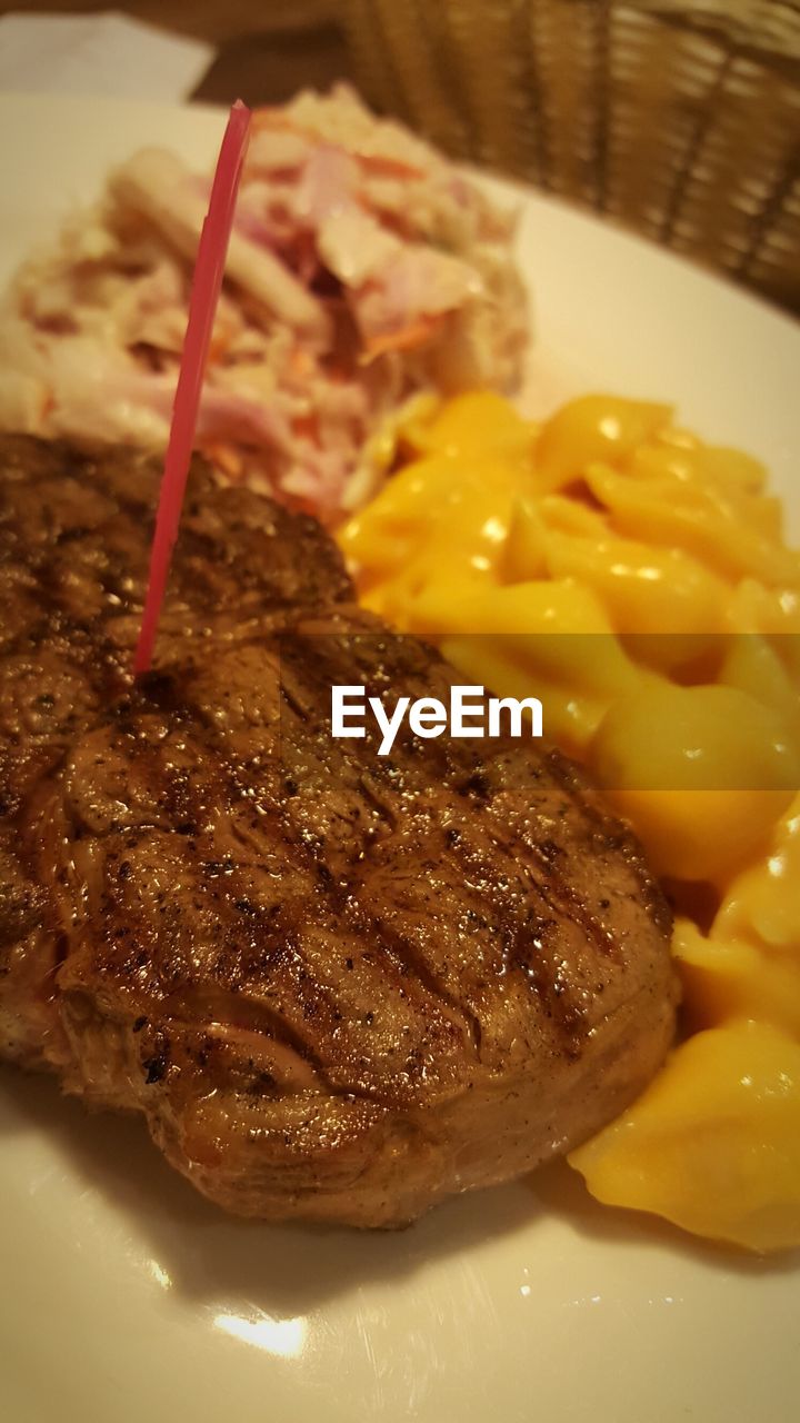 CLOSE-UP OF SERVED FOOD IN PLATE