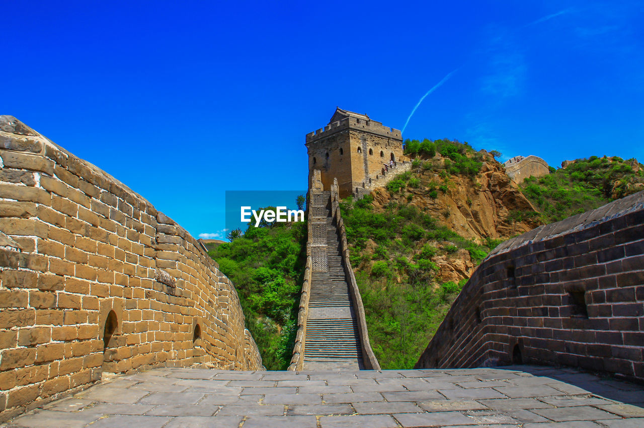 OLD RUINS AGAINST BLUE SKY