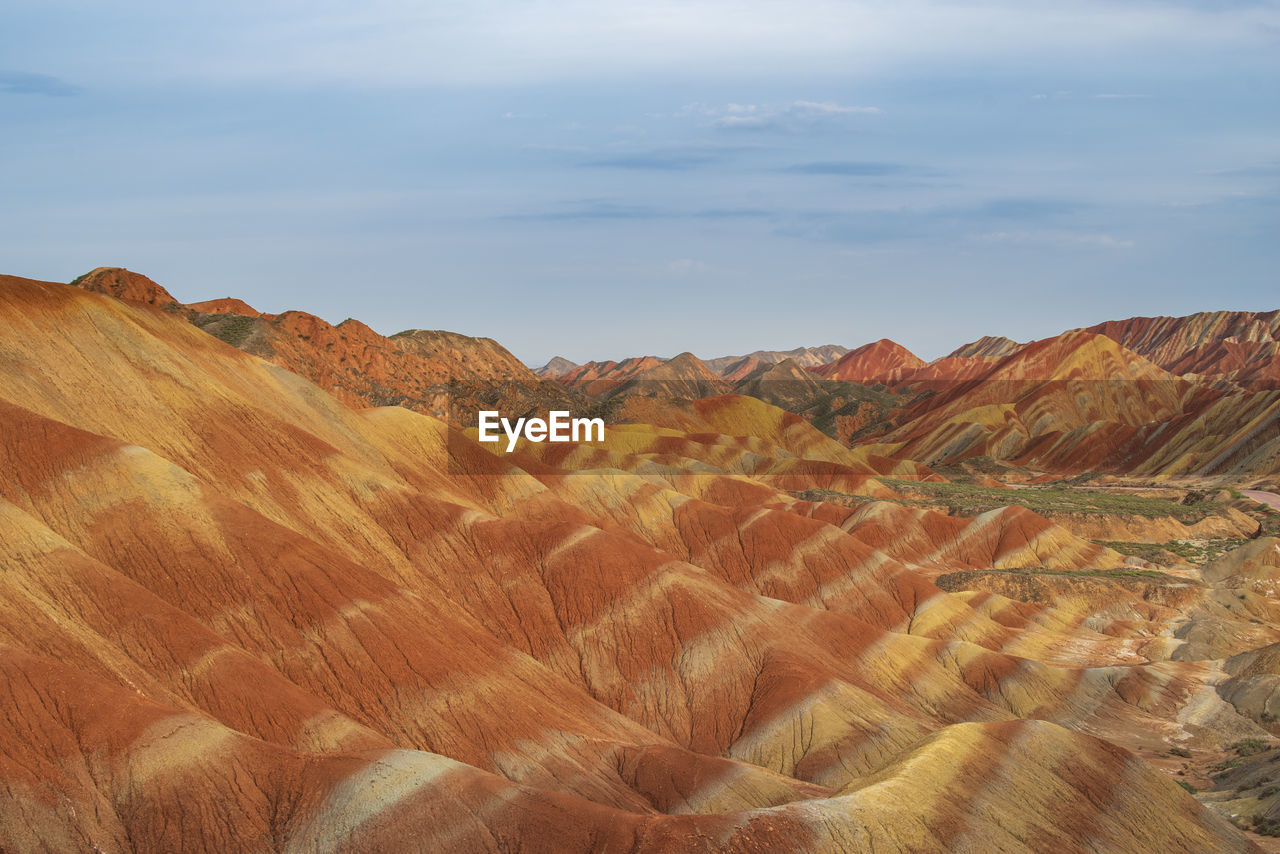 Danxia scenic view of arid landscape against sky
