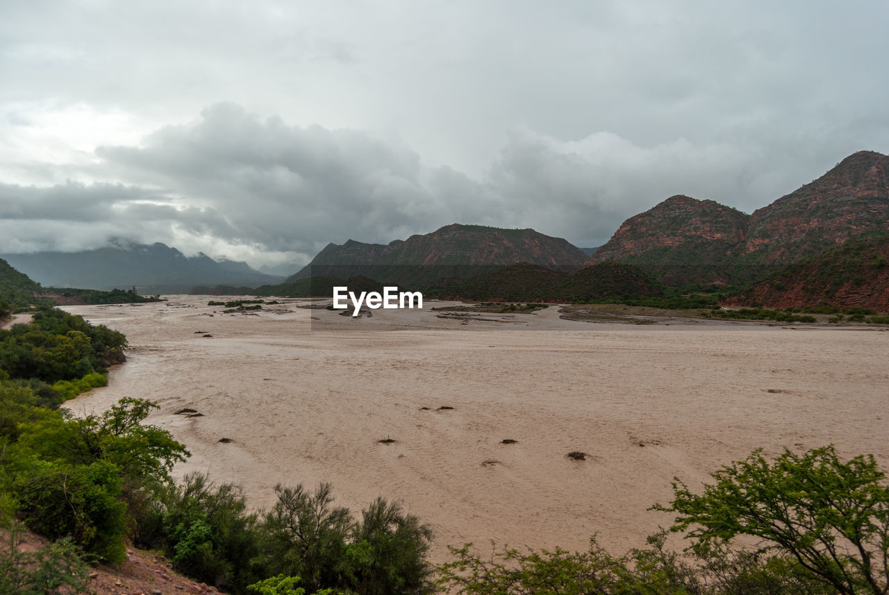 SCENIC VIEW OF MOUNTAIN AGAINST SKY