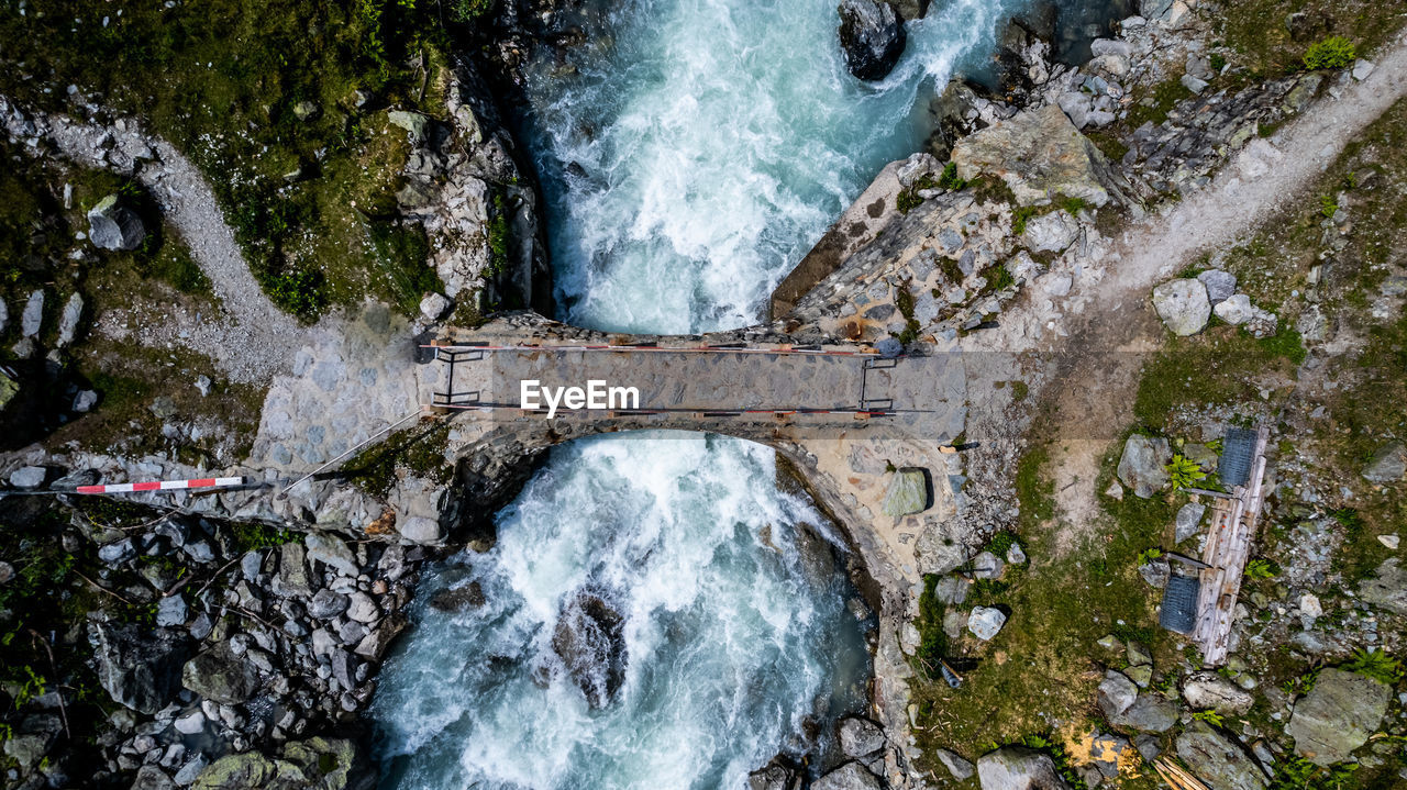 water, waterfall, nature, motion, water feature, beauty in nature, scenics - nature, flowing water, rock, long exposure, plant, high angle view, day, no people, tree, outdoors, land, stream, river, sports, environment, forest, blurred motion, body of water, flowing, splashing, autumn, non-urban scene, water sports, rock formation